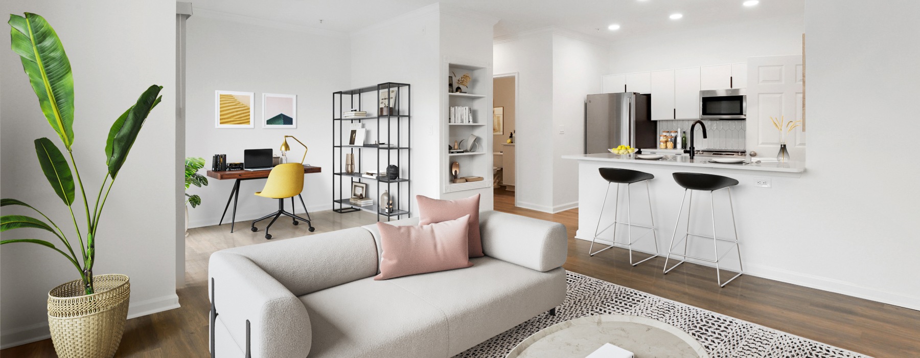 Spacious living room with well-appointed kitchen